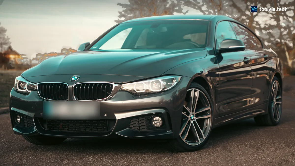 Dark grey BMW 4 Series Gran Coupe with M Sport styling parked on a road